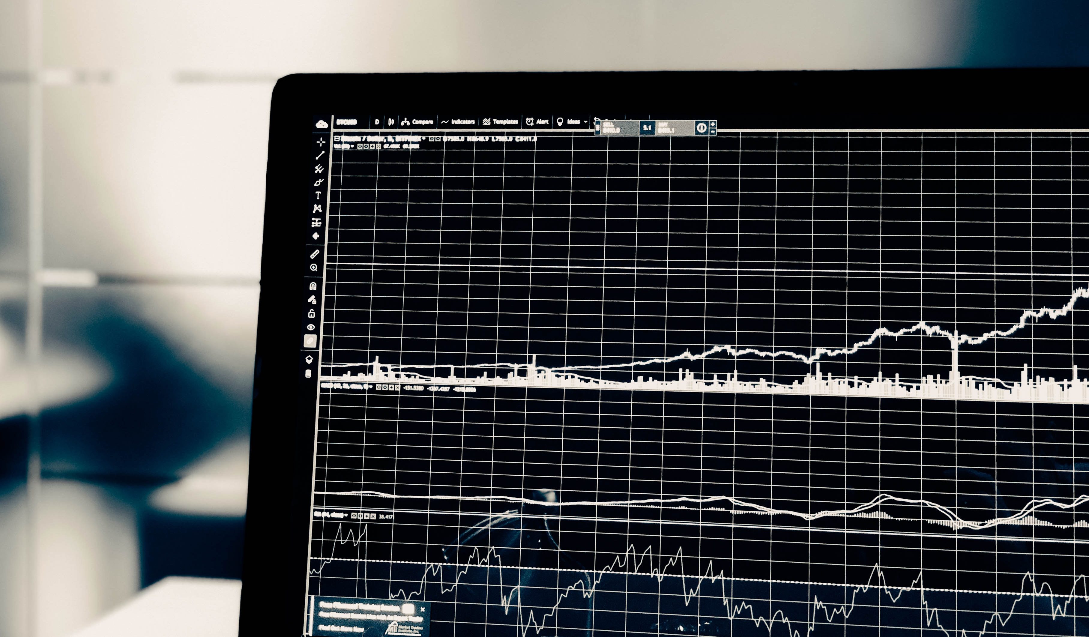 Close up of a computer screen showing line graphs