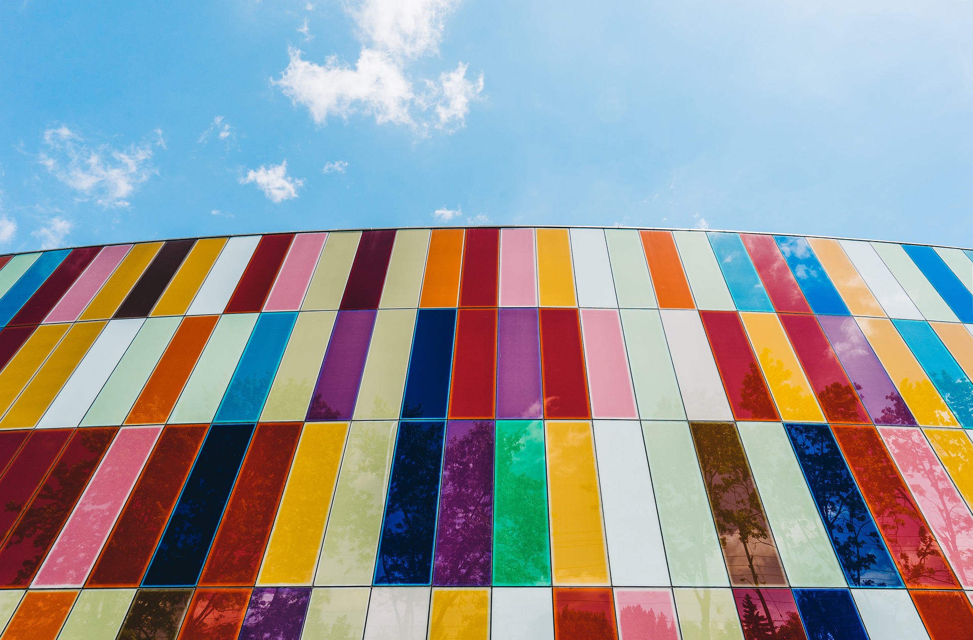 looking up at a building made of colourful blocks